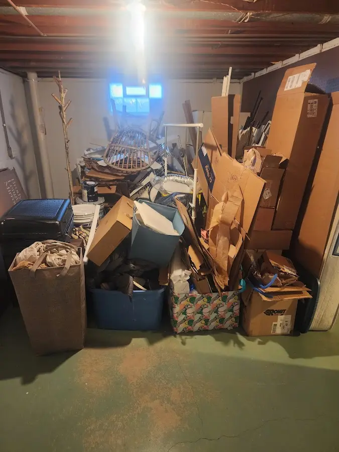 Roll-off dumpster container at job site for 2 Yard Dumpster Rental in Highland